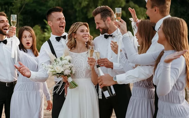 wedded couple with guets celebrating